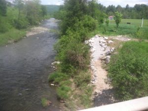 Taken from Nasmith Brook Road on the bridge where it intersects Route 2, the new public access slopes gradually downstream to the rivers edge.
