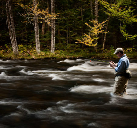 Person fishing in Vermont river