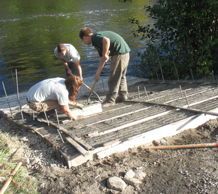Volunteers building a boat ramp at the Caanan River Access.
