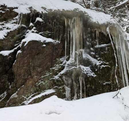 Icicles cling to a rocky outcropping in an area that will soon be added to Camel's Hump State Park.