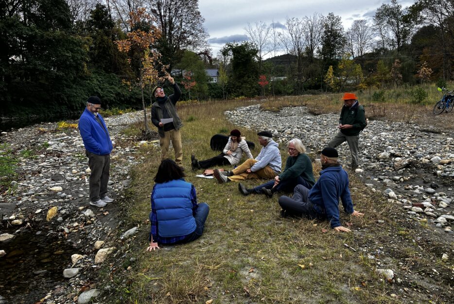 Group meditates with Peter Gould along Whetstone Brook